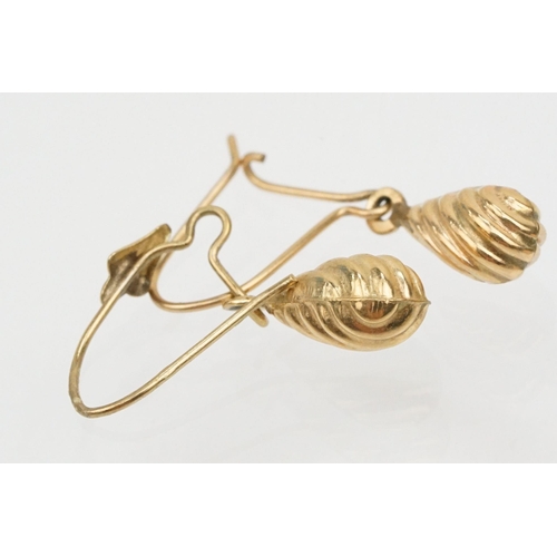 144 - Four pairs of 9ct gold earrings to include a pair of twist design hoop earrings (marked 375 to posts... 