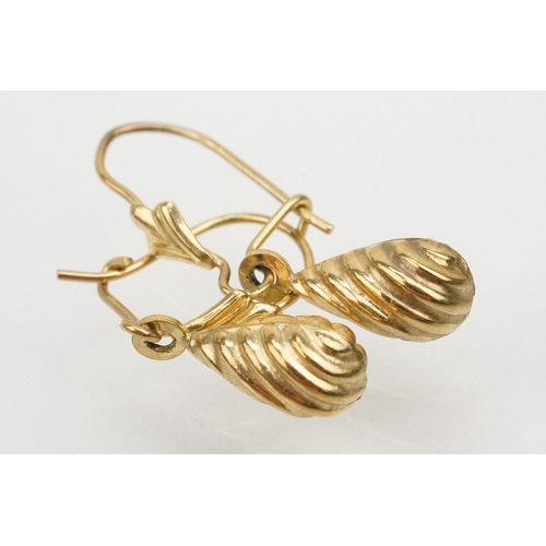 144 - Four pairs of 9ct gold earrings to include a pair of twist design hoop earrings (marked 375 to posts... 