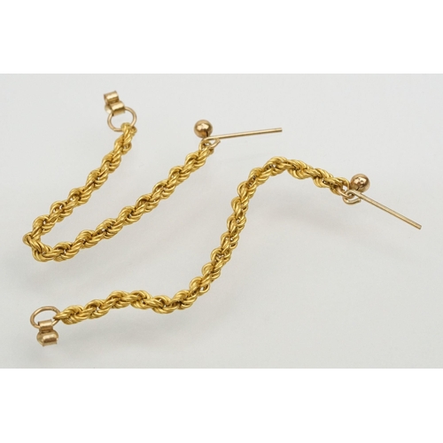 148 - 9ct gold rope twist bracelet (hallmarked to jump link), together with a pair of matching yellow meta... 