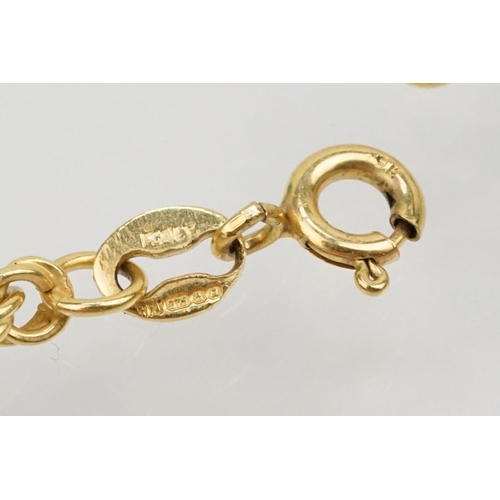 148 - 9ct gold rope twist bracelet (hallmarked to jump link), together with a pair of matching yellow meta... 