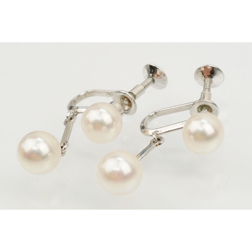 165 - Pair of 14ct gold screw back cultured pearl earrings (marked 14k, 1cm diameter), and a pair of cultu... 