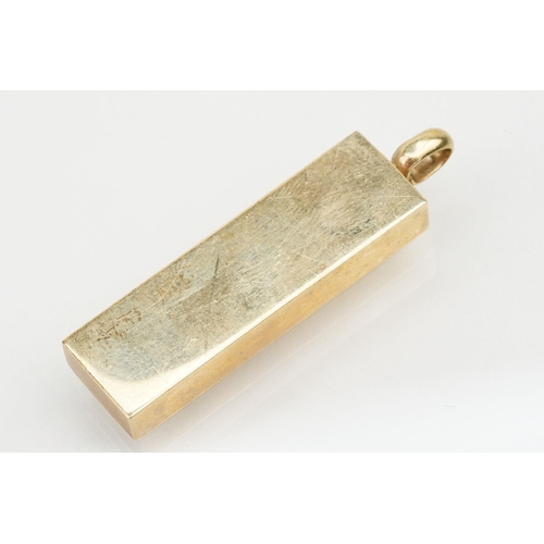 208 - 9ct gold ingot pendant. Hallmarked Sheffield 2000. Measures 5cm.