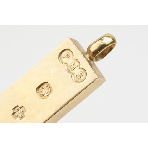 208 - 9ct gold ingot pendant. Hallmarked Sheffield 2000. Measures 5cm.