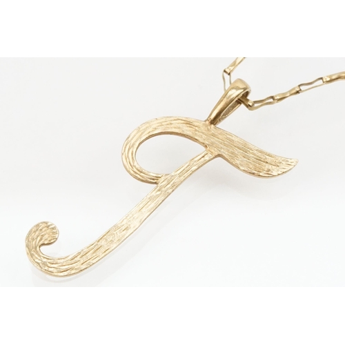 213 - 9ct gold 'T' pendant necklace having an elongated chain with spring ring clasp. Chain hallmarked to ... 