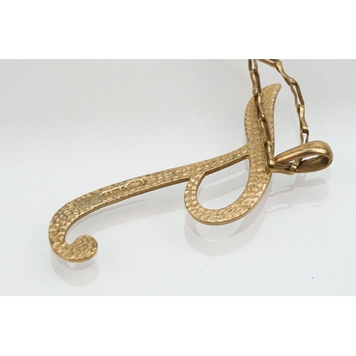 213 - 9ct gold 'T' pendant necklace having an elongated chain with spring ring clasp. Chain hallmarked to ... 