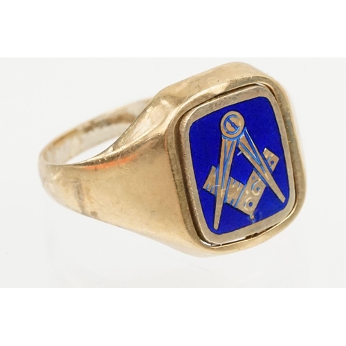 214 - 9ct gold signet ring having a blue enamelled Masonic panel swivelling to reveal engraved initials to... 