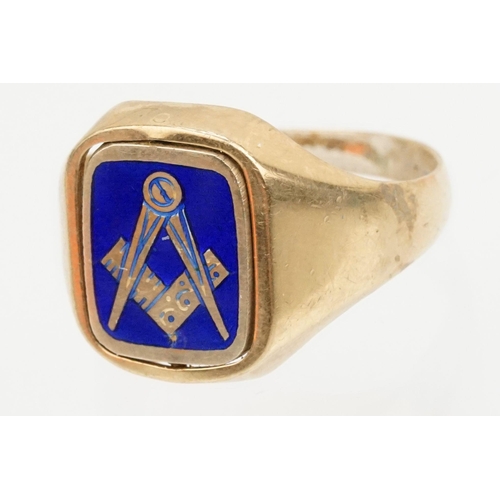 214 - 9ct gold signet ring having a blue enamelled Masonic panel swivelling to reveal engraved initials to... 