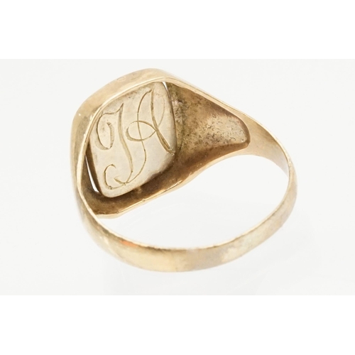 214 - 9ct gold signet ring having a blue enamelled Masonic panel swivelling to reveal engraved initials to... 