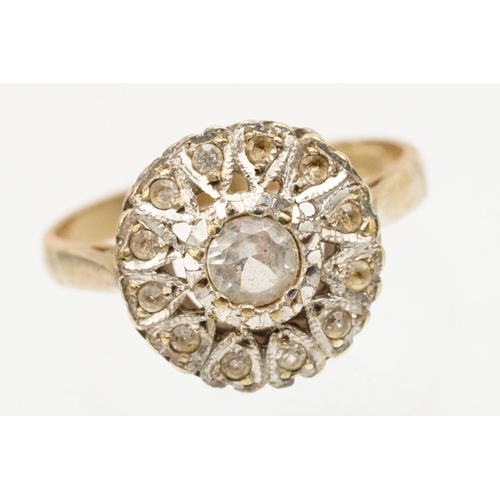 217 - 9ct gold and cz cluster ring set with a round cut cz to centre with a halo of further stones. Hallma... 