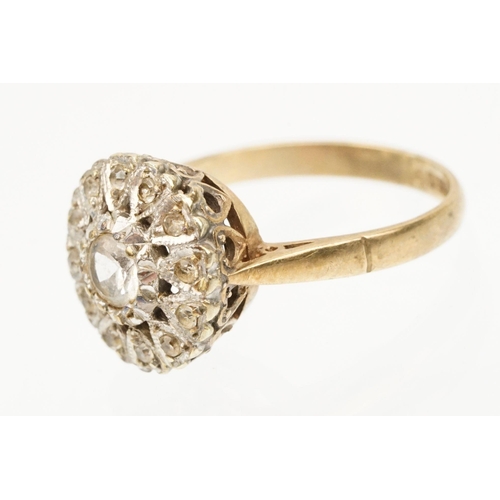 217 - 9ct gold and cz cluster ring set with a round cut cz to centre with a halo of further stones. Hallma... 