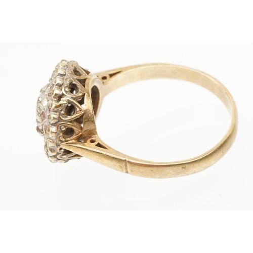 217 - 9ct gold and cz cluster ring set with a round cut cz to centre with a halo of further stones. Hallma... 