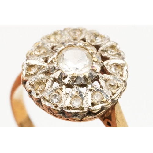 217 - 9ct gold and cz cluster ring set with a round cut cz to centre with a halo of further stones. Hallma... 