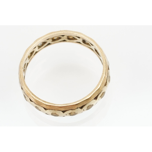 227 - 9ct two tone gold eternity ring set with white stones (marked 375, size P), together with a 9ct gold... 