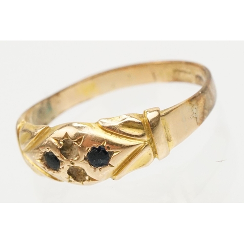 229 - Group of three gold rings to include an 18ct and platinum three stone ring (marked 18ct, size L.5), ... 