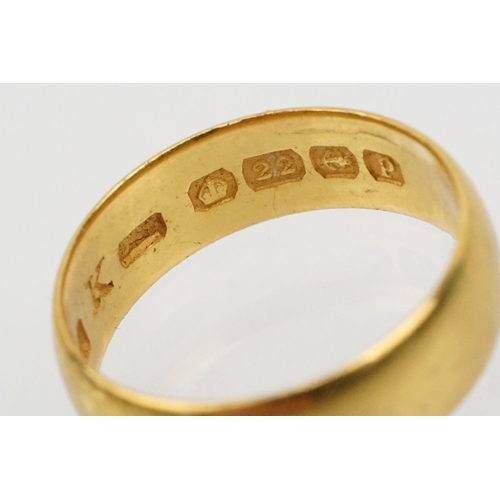 230 - Two gold wedding band rings to include a a hallmarked 22ct ring (Birmingham 1914, size K), and anoth... 