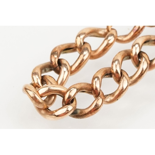 231 - 9ct rose gold curb link bracelet with spring ring clasp. Marked 9ct to clasp. Measures 8 inches.