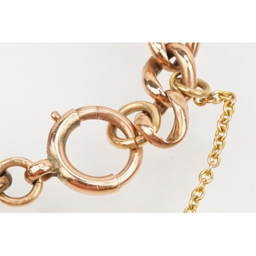 231 - 9ct rose gold curb link bracelet with spring ring clasp. Marked 9ct to clasp. Measures 8 inches.