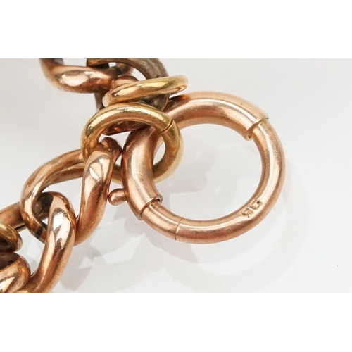 231 - 9ct rose gold curb link bracelet with spring ring clasp. Marked 9ct to clasp. Measures 8 inches.