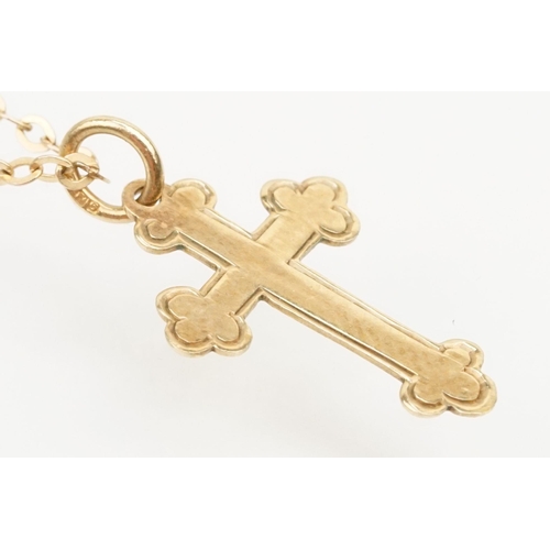 233 - Two 9ct gold cross pendant necklaces to include a plain cross on a fine curb link chain (hallmarked ... 