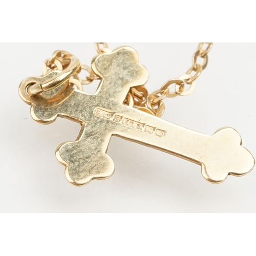 233 - Two 9ct gold cross pendant necklaces to include a plain cross on a fine curb link chain (hallmarked ... 