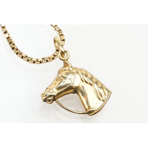 244 - 9ct gold box link chain with horse head pendant. Jump link import marked 1979, pendant marked 9ct. C... 