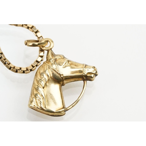 244 - 9ct gold box link chain with horse head pendant. Jump link import marked 1979, pendant marked 9ct. C... 