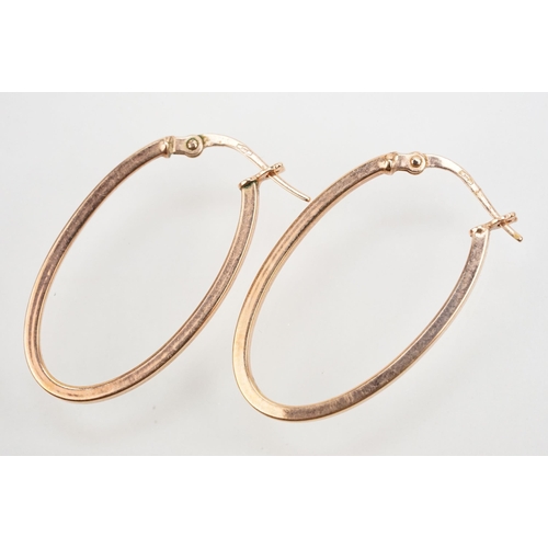 245 - Three pair of earrings to include a pair of 9ct gold oval hoop earrings (marked 375 to posts), a pai... 