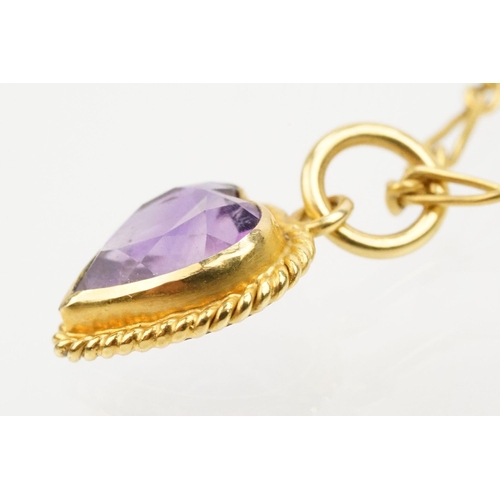 27 - 9ct gold fine link figaro chain necklace with amethyst set heart pendant. Clasp marked 9ct. Chain me... 