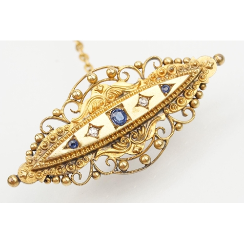 29 - Victorian 15ct gold sapphire and diamond brooch. The brooch of navette form with scrolled details wi... 