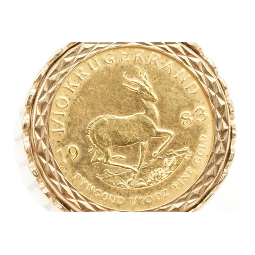 42 - 9ct gold ring set with a 1/10 oz 1938 Krugerrand coin. The ring with reeded details. Hallmarked Lond... 