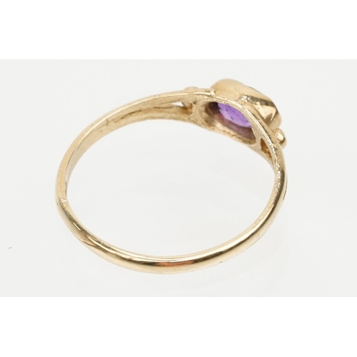 81 - 9ct gold and amethyst ring being bezel set with an oval cut amethyst (hallmarked London to shank, si... 