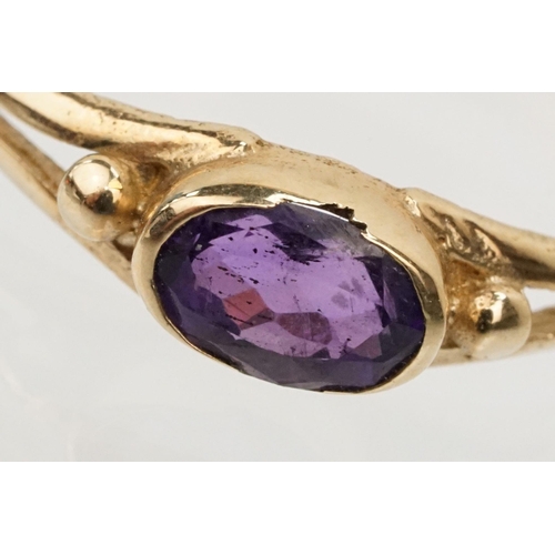 81 - 9ct gold and amethyst ring being bezel set with an oval cut amethyst (hallmarked London to shank, si... 