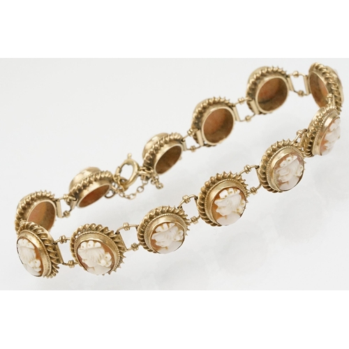 82 - 9ct gold cameo bracelet constructed from carved shell cameos in rope twist mounts with spring ring c... 