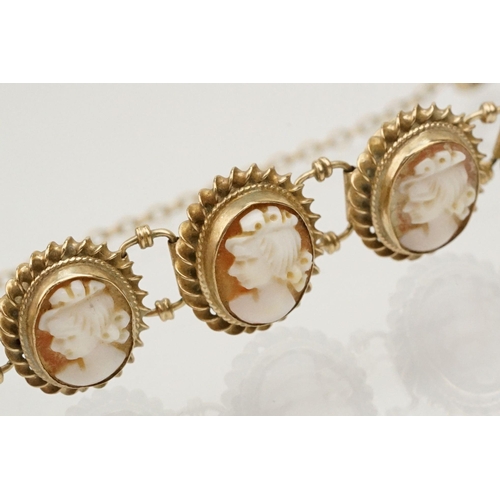 82 - 9ct gold cameo bracelet constructed from carved shell cameos in rope twist mounts with spring ring c... 