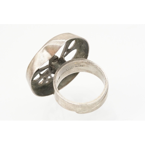 84 - Group of four Scandinavian silver mid 20th Century rings to include an N E From Danish black stone r... 