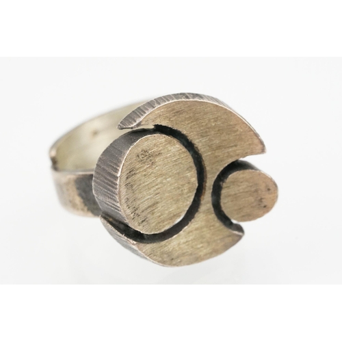 84 - Group of four Scandinavian silver mid 20th Century rings to include an N E From Danish black stone r... 