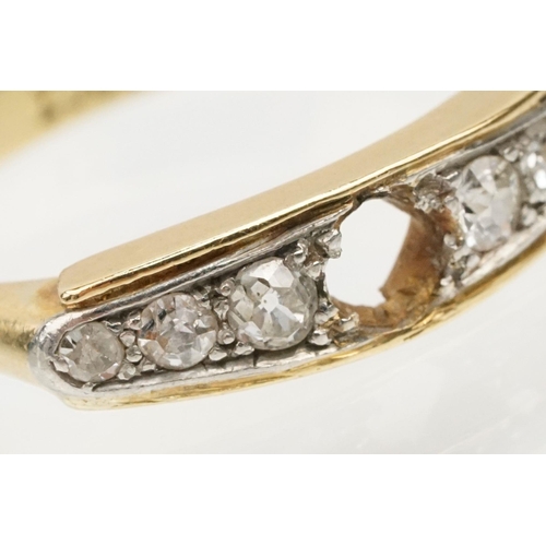 85 - 18ct gold and diamond ring. The ring being set with six round old cut diamonds with central stone mi... 