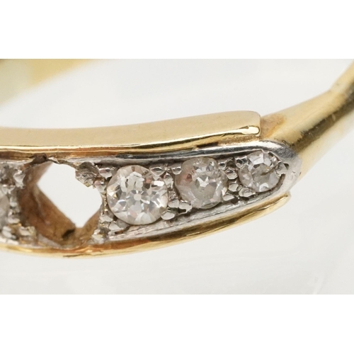 85 - 18ct gold and diamond ring. The ring being set with six round old cut diamonds with central stone mi... 