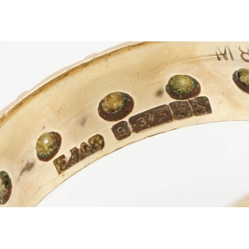 95 - 9ct gold eternity ring having a wide band with marquise moulded details and set with white stones. H... 