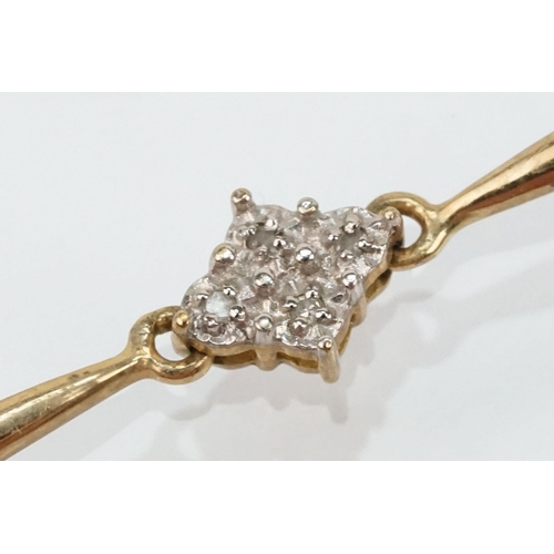 104 - 9ct gold and diamond line bracelet having bar links with diamond clusters. Marked 375. Measures 7.5 ... 