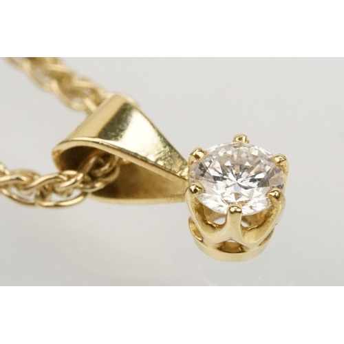 105 - 18ct gold and diamond pendant set to a 9ct gold wheat link necklace chain. Diamond estimated 0.20ct,... 