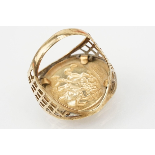 108 - Two 9ct gold rings to include a George and the Dragon signet ring (hallmarked to shank, size R) and ... 