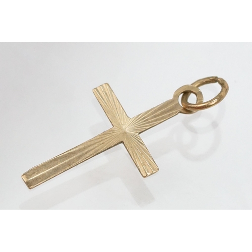 109 - Group of 9ct gold cross pendants to include a twist design example (hallmarked to bale), two plain c... 