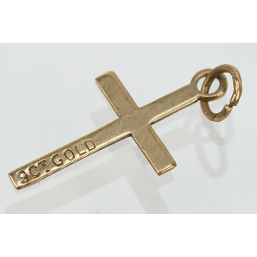 109 - Group of 9ct gold cross pendants to include a twist design example (hallmarked to bale), two plain c... 