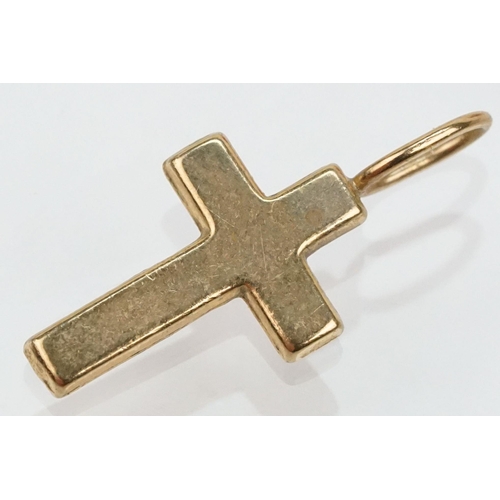 109 - Group of 9ct gold cross pendants to include a twist design example (hallmarked to bale), two plain c... 