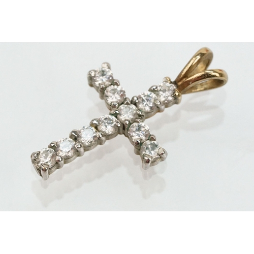 109 - Group of 9ct gold cross pendants to include a twist design example (hallmarked to bale), two plain c... 