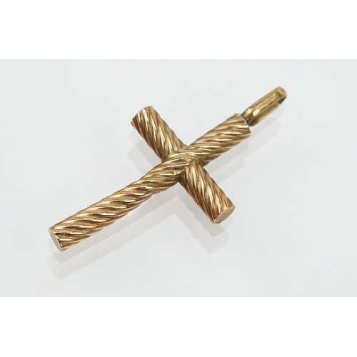 109 - Group of 9ct gold cross pendants to include a twist design example (hallmarked to bale), two plain c... 