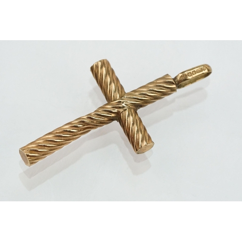 109 - Group of 9ct gold cross pendants to include a twist design example (hallmarked to bale), two plain c... 