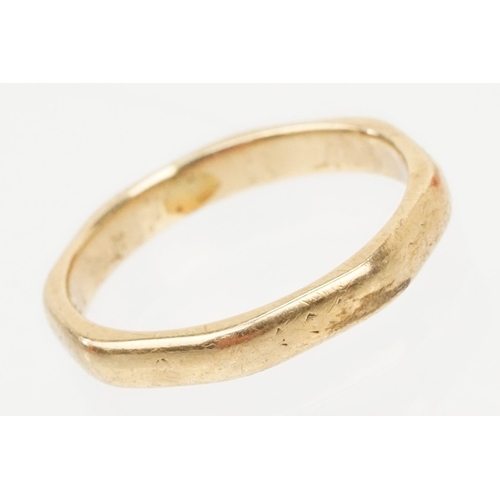 110 - 9ct gold and white stone eternity ring with incised details (marked 9ct, size K) together with a 9ct... 