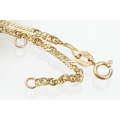 111 - Group of three 9ct gold bracelets to include a gate link bracelet with heart lock clasp (hallmarked ... 